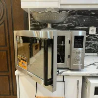 مایکروفر 34L تکنو با جوجه گردان مناسب جهیزیه نونو