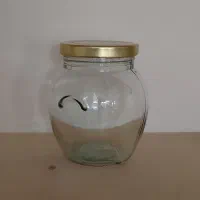 جار شیشه‌ای گوشواره‌ای (با در)