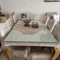 میز ناهار خوری و یک عدد شلزمن(کاناپه راحتی)