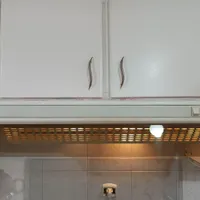 کلیه کابینت های فلزی . در حد نو .هود .سینک دولگن