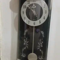 ساعت دیواری زیبا و پاندول دار