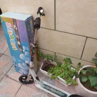 اسکوتر با جعبه سالم کم کارکرد