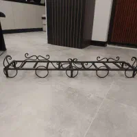 استند فلزی برای گذاشتن هیزم داخل شومینه