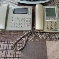 گوشی تلفن و بخاری برقی