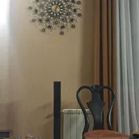 ساعت دیواری پر نگین