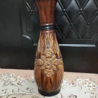 گلدان سفالی و گل تزیینی