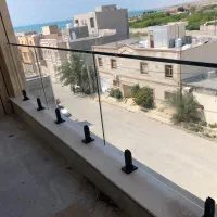 تولید ‌واجرا انواع نما شیشه ای کرتین وال و اسپایدر