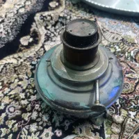 زیر سماوری نفتی کلیکسونی|کلکسیون اشیاء عتیقه|اهواز, زندوکیلی|دیوار