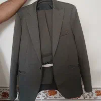 یک ست کت شلواررنگ خاکستری سایز۵۰ قیمت ۱۵۰۰