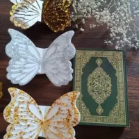 رحل قرآن به همراه خط بر قرآن رزینی