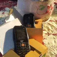 گوشی کترپیلار ساده مموری خور و دوربین دار