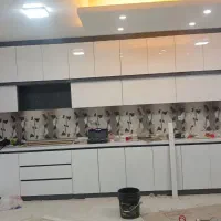 ساخت انواع کابینت وکمد دیواری درب های چوبی