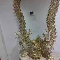 آیینه و شمعدان و ساعت