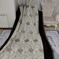 کتیبه کنار پرده یک طرف