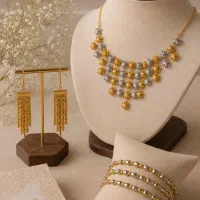 سرویس طلا شامل گردنبند، گوشواره و دستبند و النگو