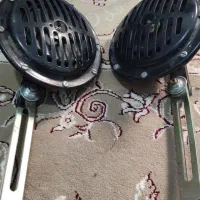 تعدادی قطعات ماشین و موتور