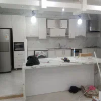 نصاب انواع برچسب کابینت‌ و نصب انواع ماربل شیت