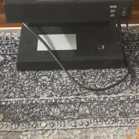 دستگاه تشخیص اصالت اسکناس نونو