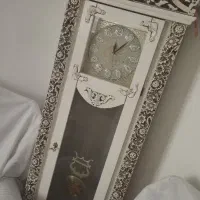آینه وکنسول و ساعت ایستاده
