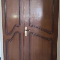 درب چوبی آپارتمانی و حفاظ نرده ای درب و آبگرم کن
