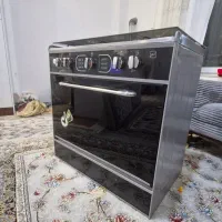 اجاق گاز ۵شعله مشکی درحد نو