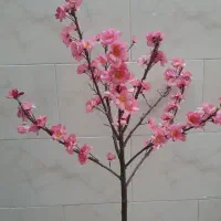 گل مصنوعی همرا با گلدان