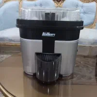 آبمیوه گیری (مرکبات) دو قلو