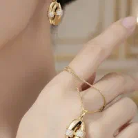 نیم ست نگین دار طرح طلا برند ژوپینگ