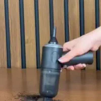 خلاصی از گرد و خاک ماشین با جارو برقی کوچک