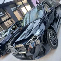 Bmw Ix1 کربن بلک بی ام با کیت ام