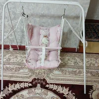 تاب کودک همراه با پایه ایستاده