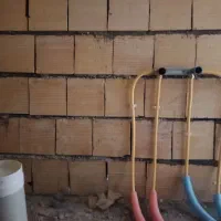 خورده کاری تاسیسات گرمایش از کف نصب پمپ فاضلاب