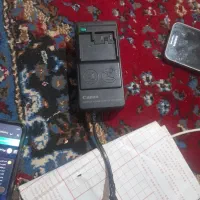 تلفن بی سیم وشارژر باطری کنون