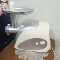 چرخ گوشت و ساعت ایستاده
