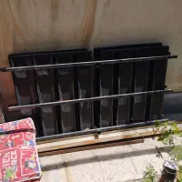 زیر تختی فلزی سنگین دو نفره