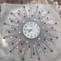 ساعت دیواری فلزی