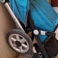کالسکه گودبی بی و کاپشن بچگانه