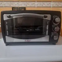 توستر دارای جوجه گردان و فن و چراغ
