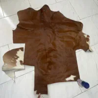 پوست گاو برش خورده قهوه ای پوست حیوان‌