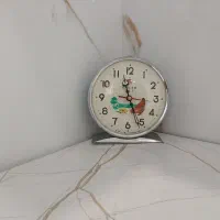 ساعت زیبا و آنتیک کم یاب مرغی