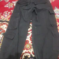 شلوار ۸جیب دارم. با یک عدد تبلت فروش فوری