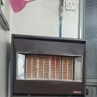 زیر تلویزیونی سالم و درحد نو. بخاری دیواری سالم