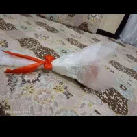 دسته گل روبانی قرمز
