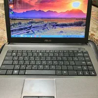 لپ تاپ ASUS با کیبورد و موس و کیف لپ تاپ