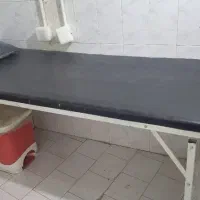 تخت تاشو سالنی و دستگاه وکس