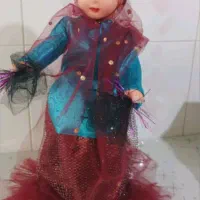 عروسک با لباسهای محلی
