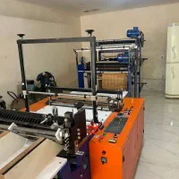 دستگاه دوخت و برش نایلکس