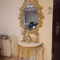 آینه، شمعدانی، ساعت و پایه