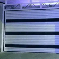 درب‌برقی‌.   چشمی‌ثابت‌ومتحرک