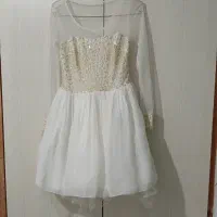 تعدادی لباس مجلسی و دامن و مانتو